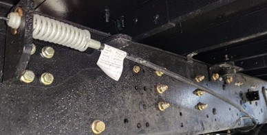 Figure 4 – Parking brake cable tension accumulator (uncompressed).